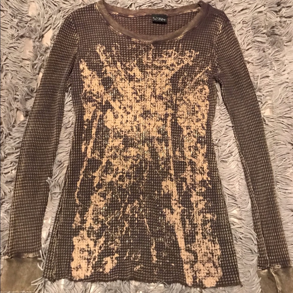Daytrip thermal with gold flecks on the front.